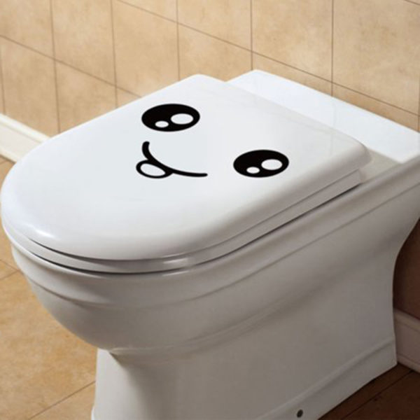 Playful smiling toilet sticker