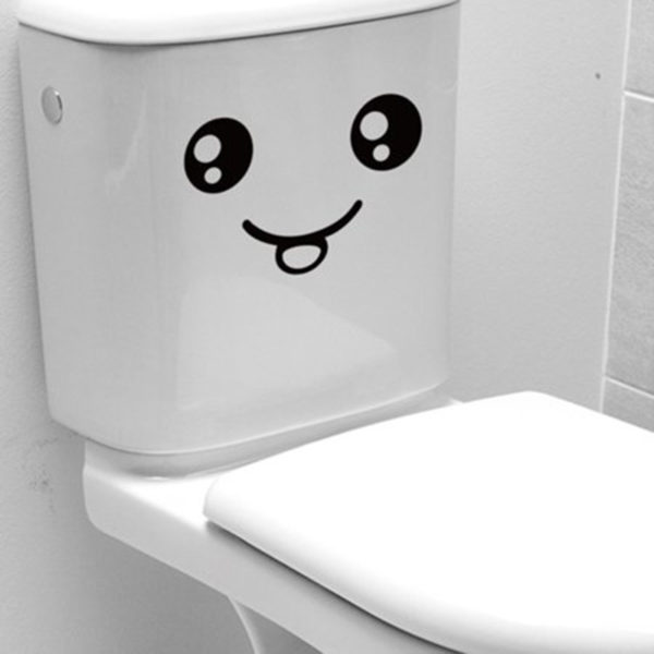 Playful smiling toilet sticker