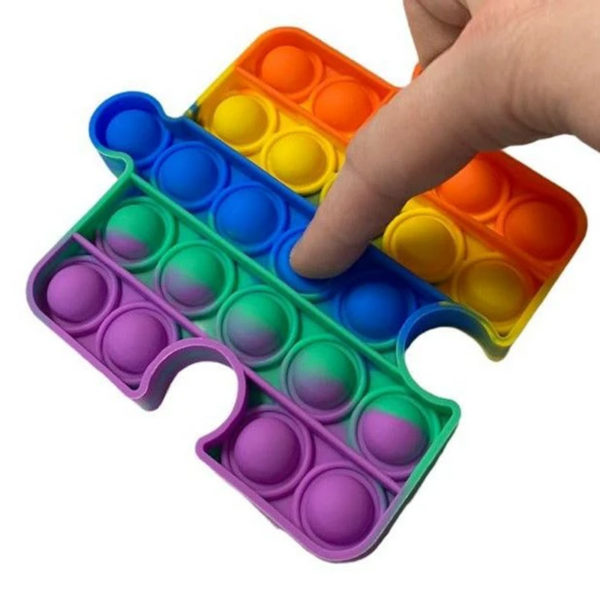 Jeu multifonction ludique “Pop” en silicone Puzzle | Arc-en-Ciel