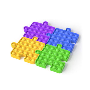 Jeu “Pop” en silicone composé de 4 Puzzles